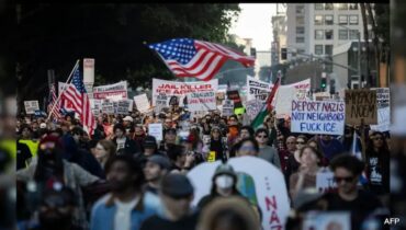 അമേരിക്കയിൽ അലയടിച്ച് പ്രതിഷേധം, മിനിയാപൊളിസിലും പോർട്ട്‌ലൻഡിലും വെടിവെപ്പ്; ഐസ് ഔട്ട് എന്ന മുദ്രാവാക്യം മുഴക്കി ആയിരങ്ങൾ